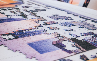 unfinished puzzle on table