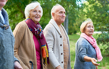 residents on a walk together outside
