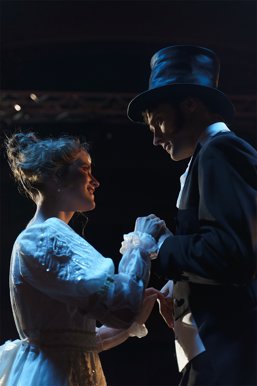 actors with costumes on performing